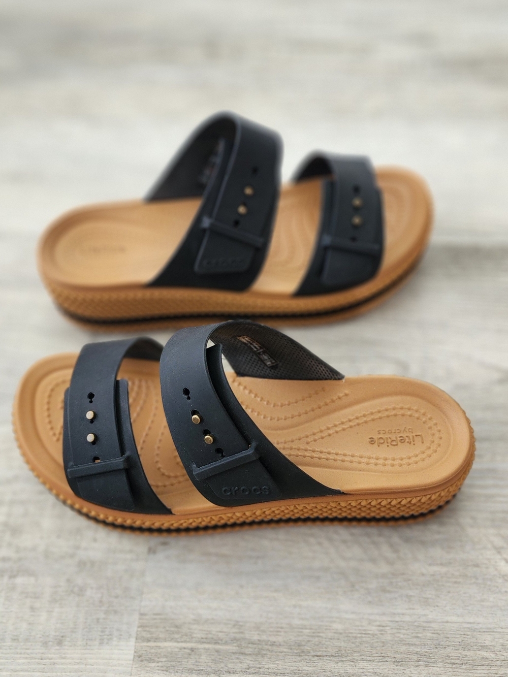 Crocs Two-Strap Slide Sandals in Black and Tan